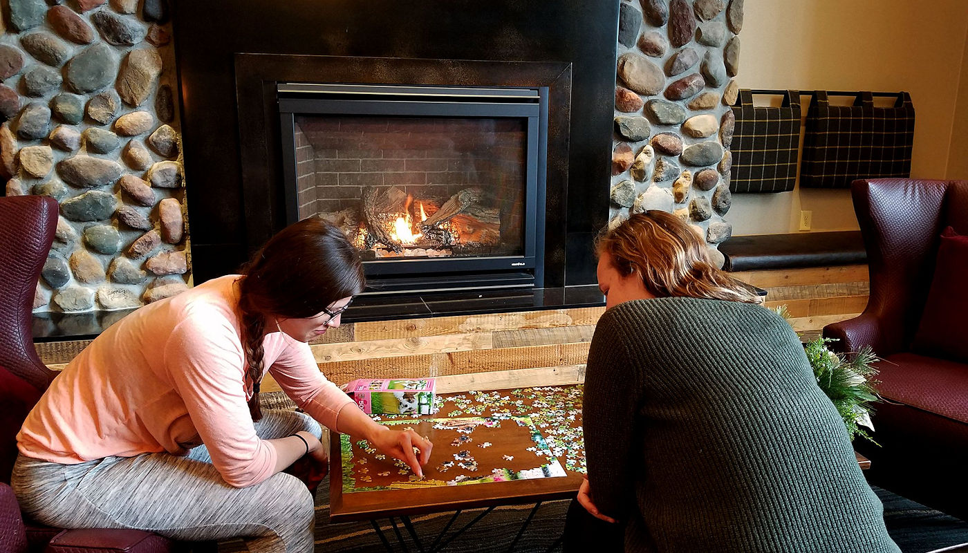 Relax in our beautiful Fireside Great Room at the Best Western Plus Superior Inn Grand Marais